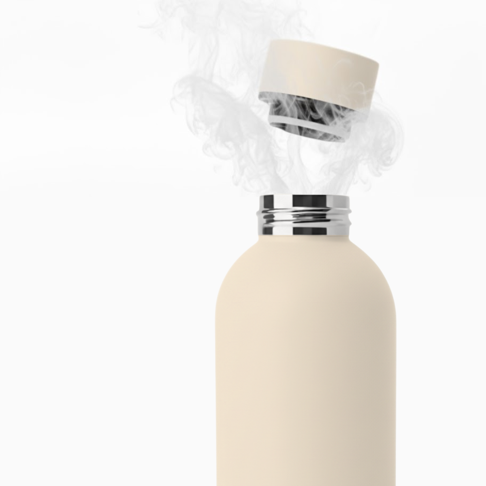 An open champagne-coloured PurePop Core flask with steam rising towards its cap.