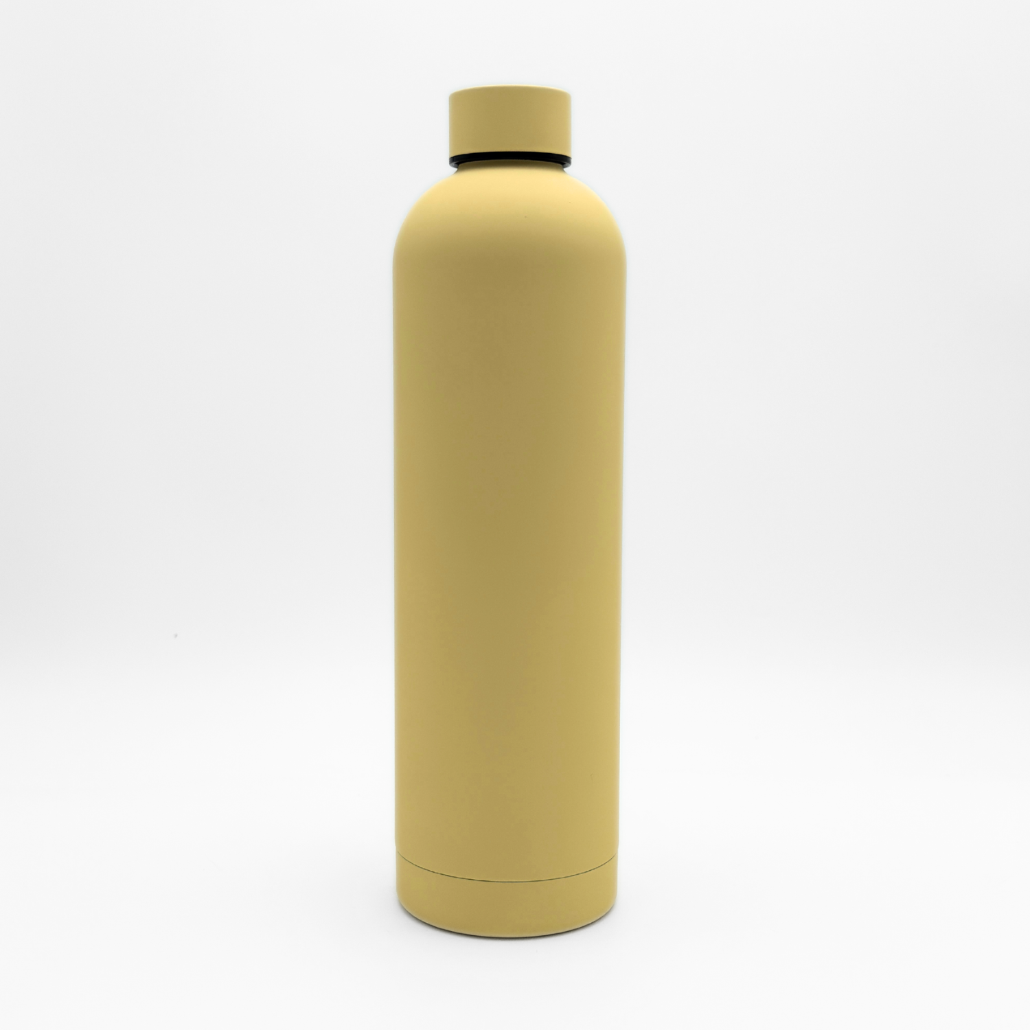 A tall, plain, matte Canary Yellow Core Series Plus insulated flask with a screw-on cap stands upright on a white background.
