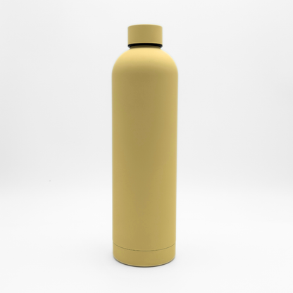 A tall, plain, matte Canary Yellow Core Series Plus insulated flask with a screw-on cap stands upright on a white background.