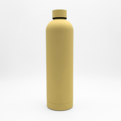 The Core Series Plus | Canary Yellow water bottle stands upright on a white background, featuring a matte yellow finish and a screw-on lid. Crafted with double-walled stainless steel for superior insulation, this leakproof flask keeps your drinks hot or cold—making it perfect for taking anywhere.