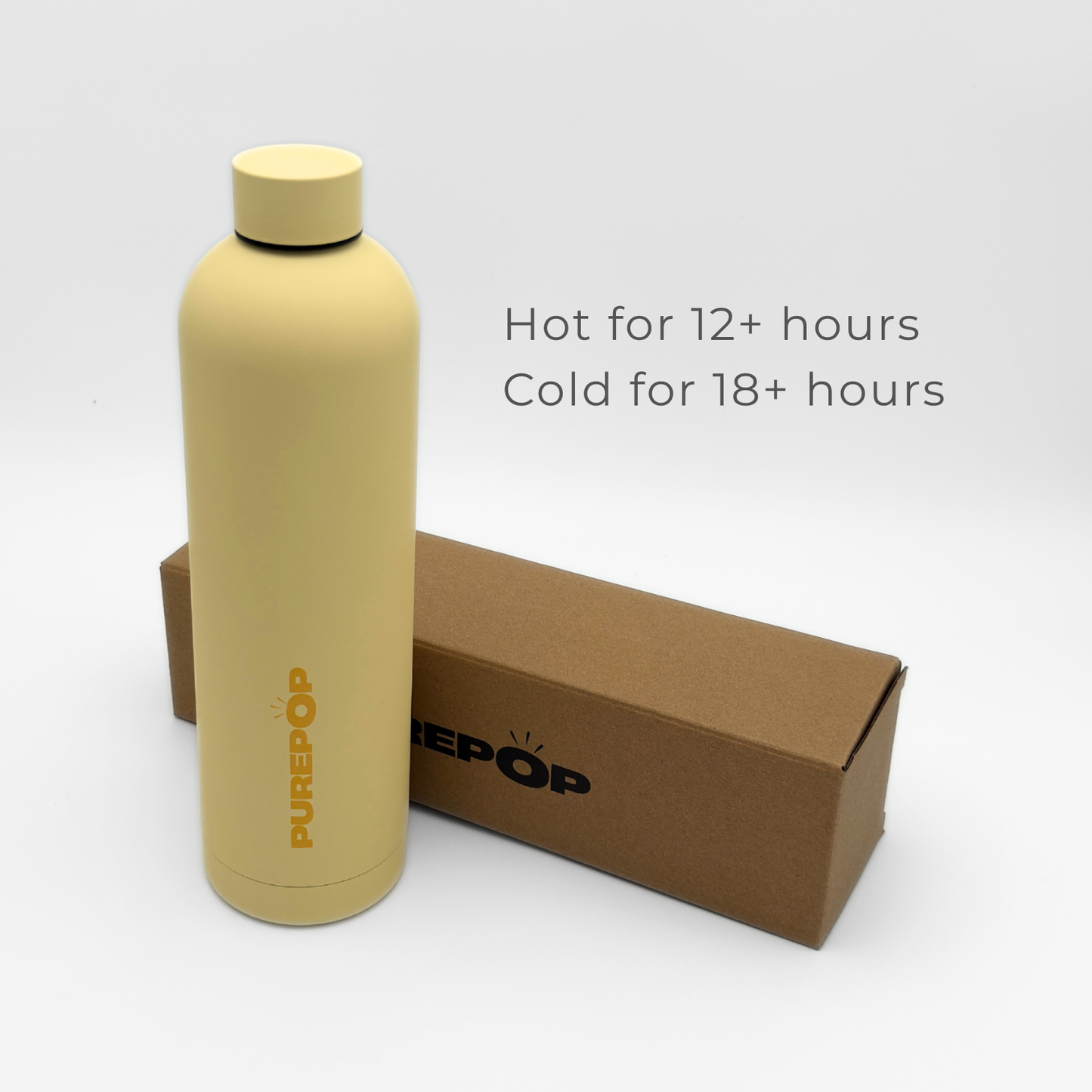 A Core Series Plus | Canary Yellow insulated flask stands beside a brown box on a white background. Text reads: Hot for 12+ hours, Cold for 18+ hours, thanks to its double-walled stainless steel construction.