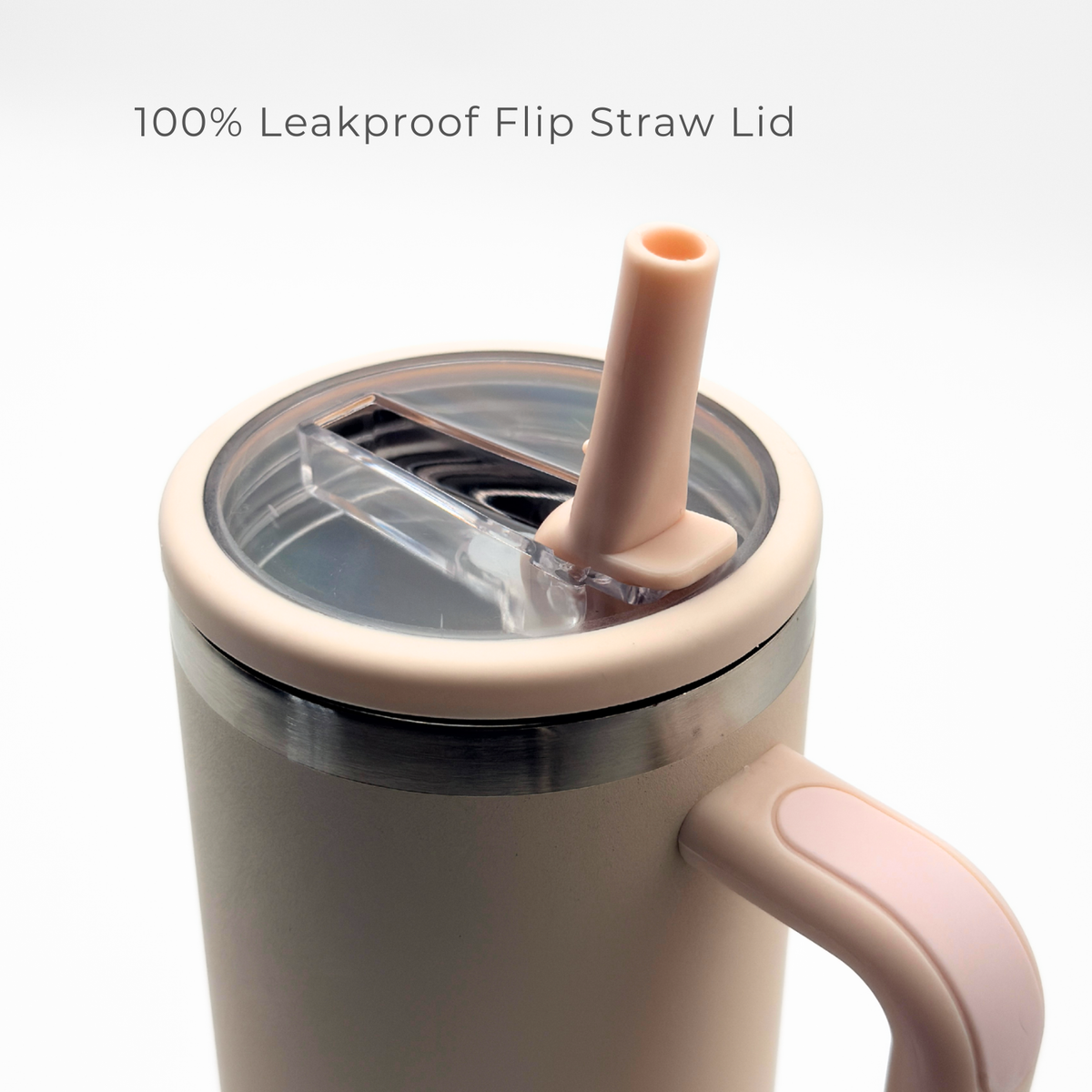 A close-up of the PurePop™ Carry Series | Rose Quartz tumbler, showcasing its ergonomic handle and 100% leakproof flip straw lid. Text above highlights these features.