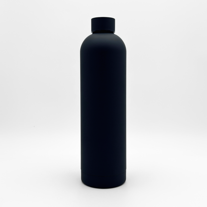 The Core Series Plus | Onyx Black is a matte black, cylindrical double-walled stainless steel water bottle with a screw-on lid, shown standing upright against a plain white background.