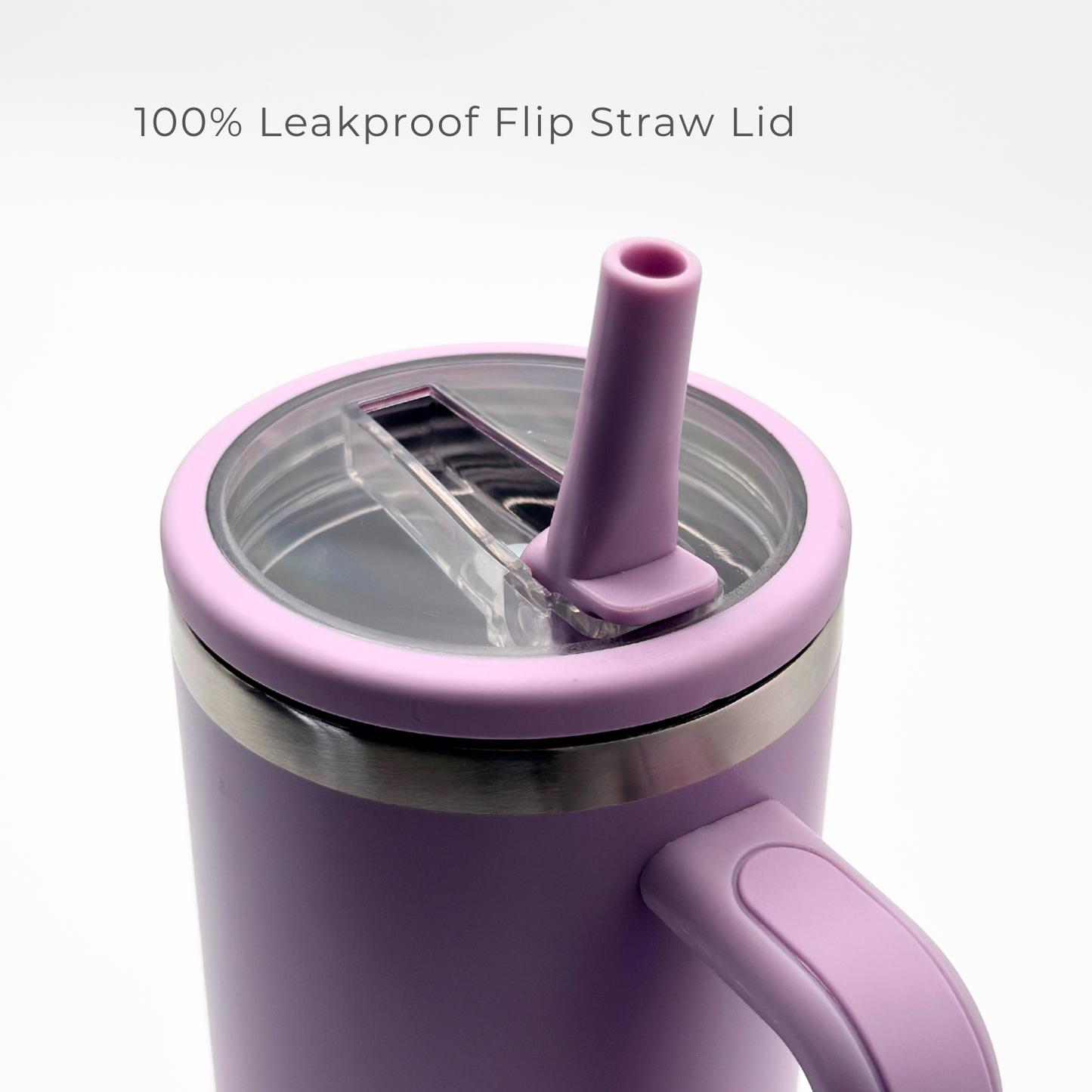 The PurePop™ Carry Series | Soft Lilac tumbler features a handle and a transparent, leakproof flip straw lid for easy upright sipping. The text above states: 100% Leakproof Flip Straw Lid.