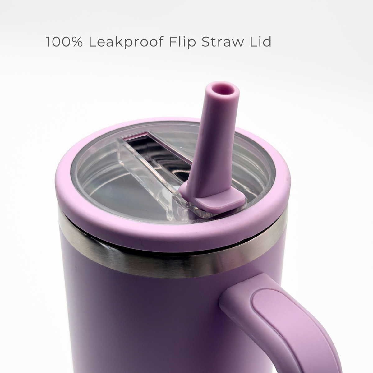 The PurePop™ Carry Series | Soft Lilac tumbler features a handle and a transparent, leakproof flip straw lid for easy upright sipping. The text above states: 100% Leakproof Flip Straw Lid.
