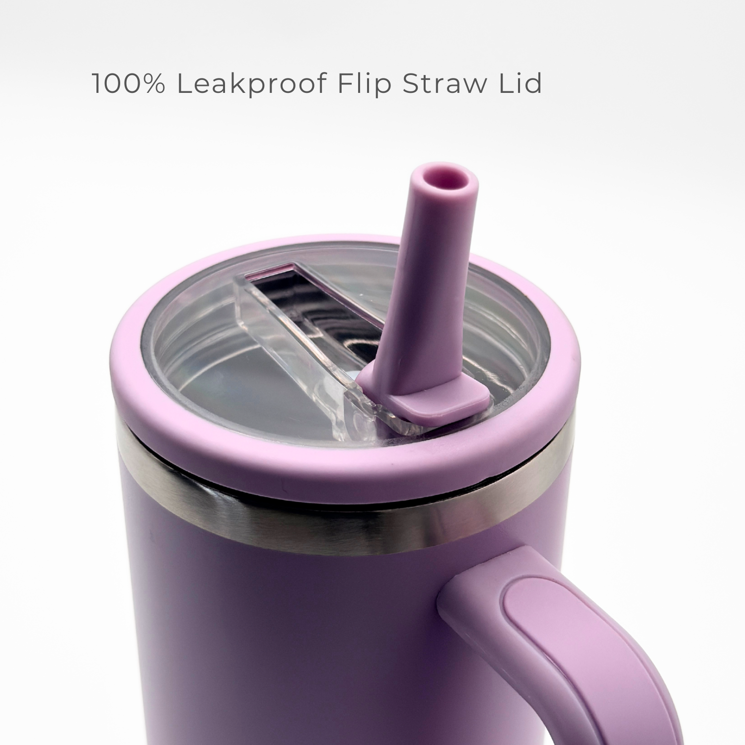 The PurePop™ Carry Series | Soft Lilac tumbler features a handle and a transparent, leakproof flip straw lid for easy upright sipping. The text above states: 100% Leakproof Flip Straw Lid.