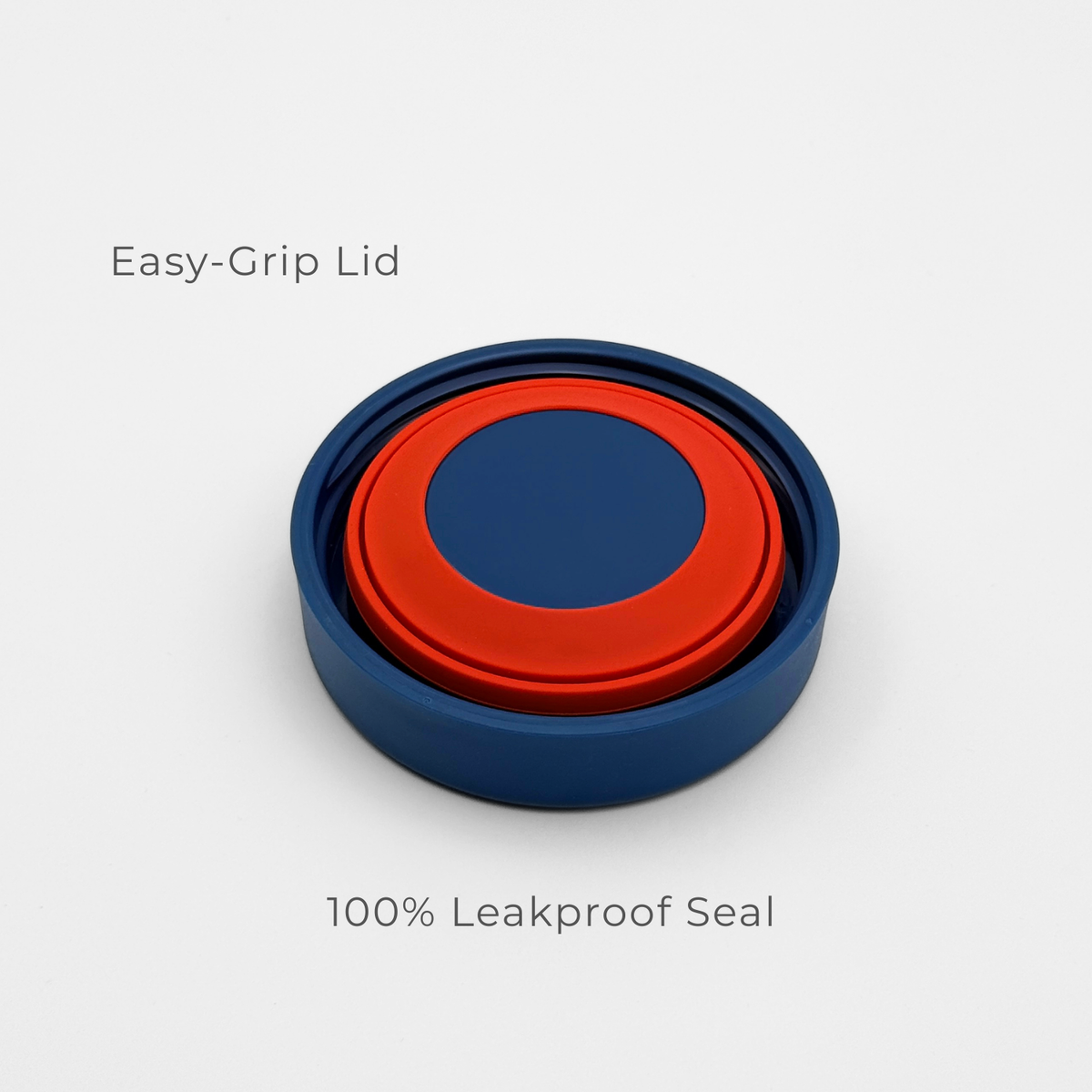The Purepop Food Flask | Royal Blue is shown on a white background with a blue and red circular lid, featuring “Easy-Grip Lid” above and “100% Leakproof Seal” below for effortless, secure use.