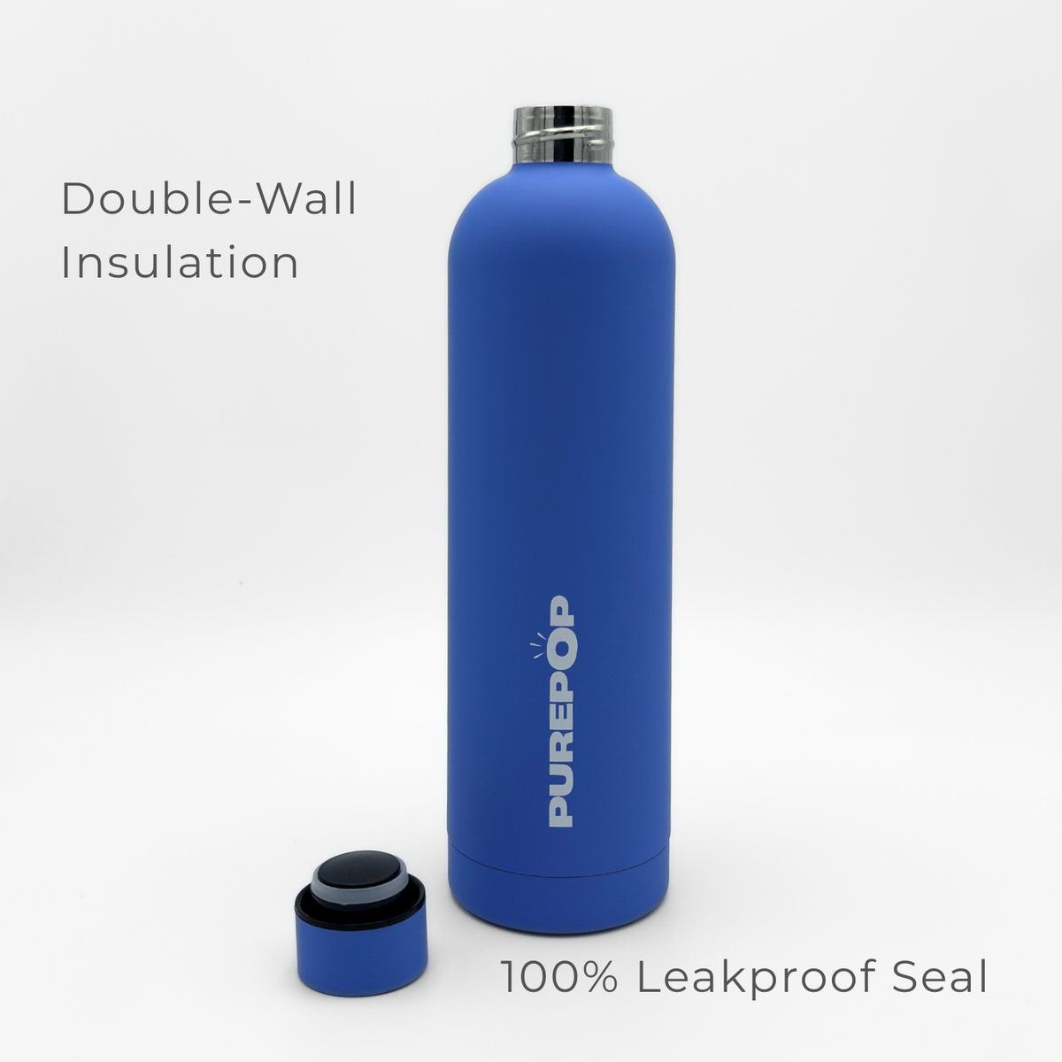 A Core Series Plus | Ultra Marine stainless steel thermal bottle with the lid off, showcasing Double-Wall Insulation on the left and a 100% Leakproof Seal below, set against a plain white background.