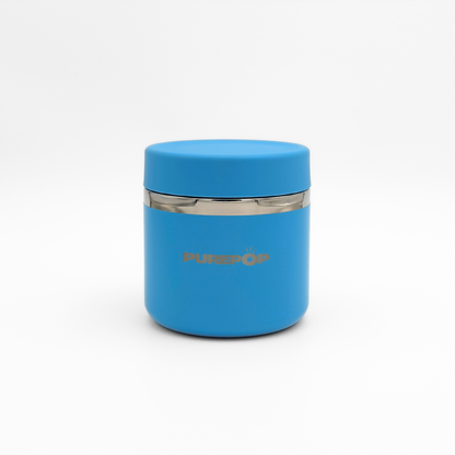 The Purepop Food Flask in Pacific Blue is a sleek, blue cylindrical container with a matching lid and silver band. "PUREPOP" is printed in gold on the front, standing out against a plain white background.
