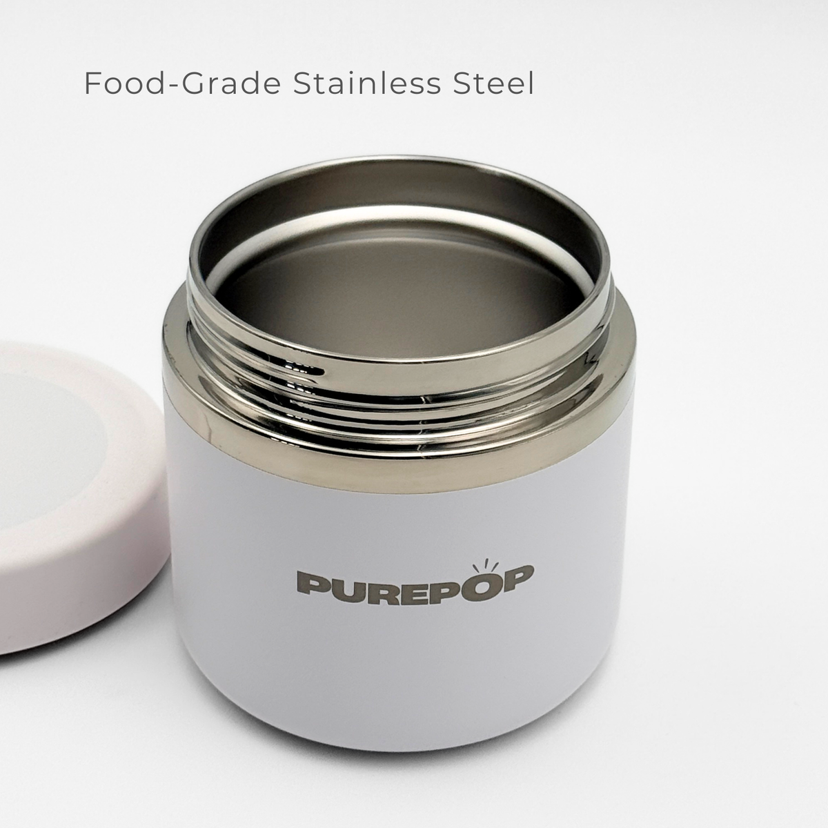A Frost White Food Flask by Purepop with an open lid rests beside it. "Purepop" is printed on the flask, and "Food-Grade Stainless Steel" appears above, all set against a simple white background for a modern look.