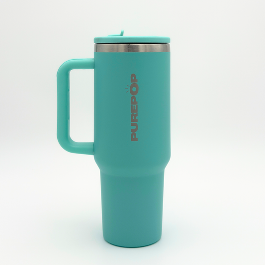 A Eucalyptus Carry Series PurePop™ travel mug with a handle and stainless steel rim stands upright on a white background, featuring the brand name printed vertically in silver.