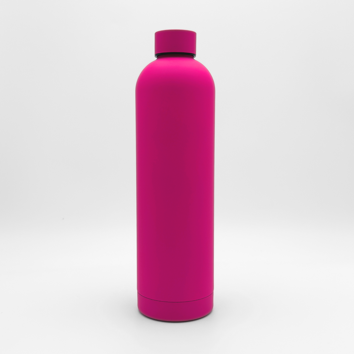 The Core Series Plus | Blush Magenta, a bright pink cylindrical leakproof water bottle with a matching screw-on cap, stands upright on a plain white background.