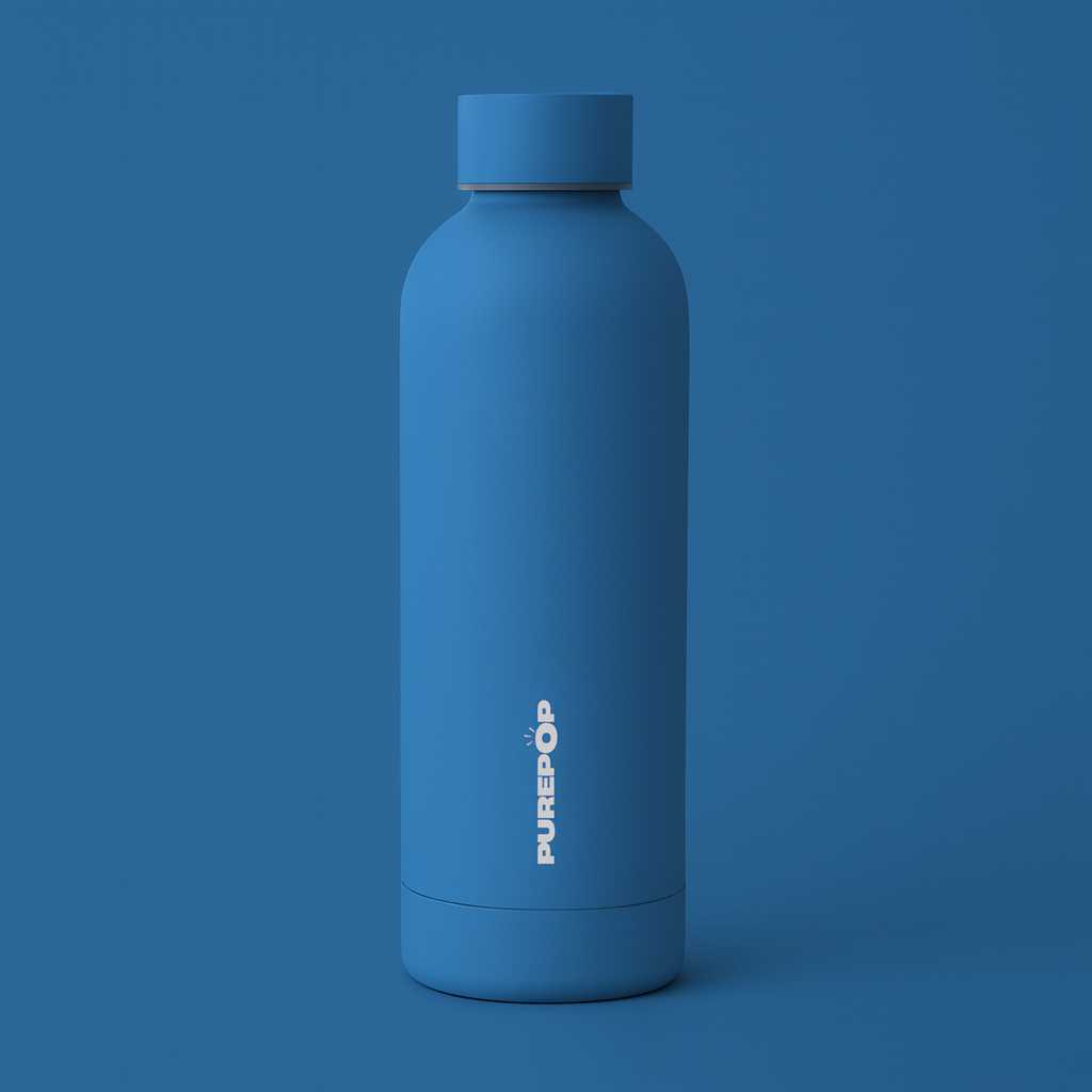 A Gift Card displayed with a matte blue reusable water bottle featuring "PUREPÖP" in white on the front, both standing upright against a matching blue background—an ideal pair for gifting.