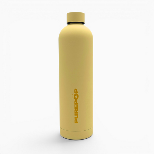 A Canary Yellow Core Series Plus flask with a black cap stands upright on a white background. The word PUREPOP is printed in vertical gold lettering along the side, emphasizing the bottle’s blend of modern style and dependable thermal insulation.