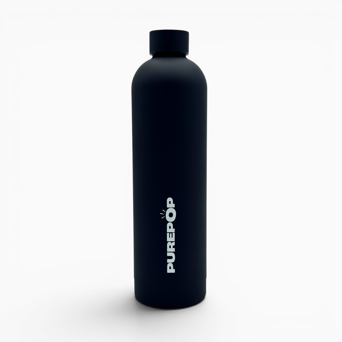 A matte black insulated flask from the Core Series Plus in Onyx Black stands upright with a screw cap. The word PUREPOP is printed vertically in bold white letters on the front against a plain white background.