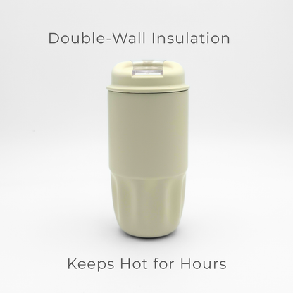 An ivory reusable coffee cup from the Sip Series, featuring double-wall insulation and a clear, leakproof lid, is centered on a white background. Text above reads Double-Wall Insulation and below reads Keeps Hot for Hours.