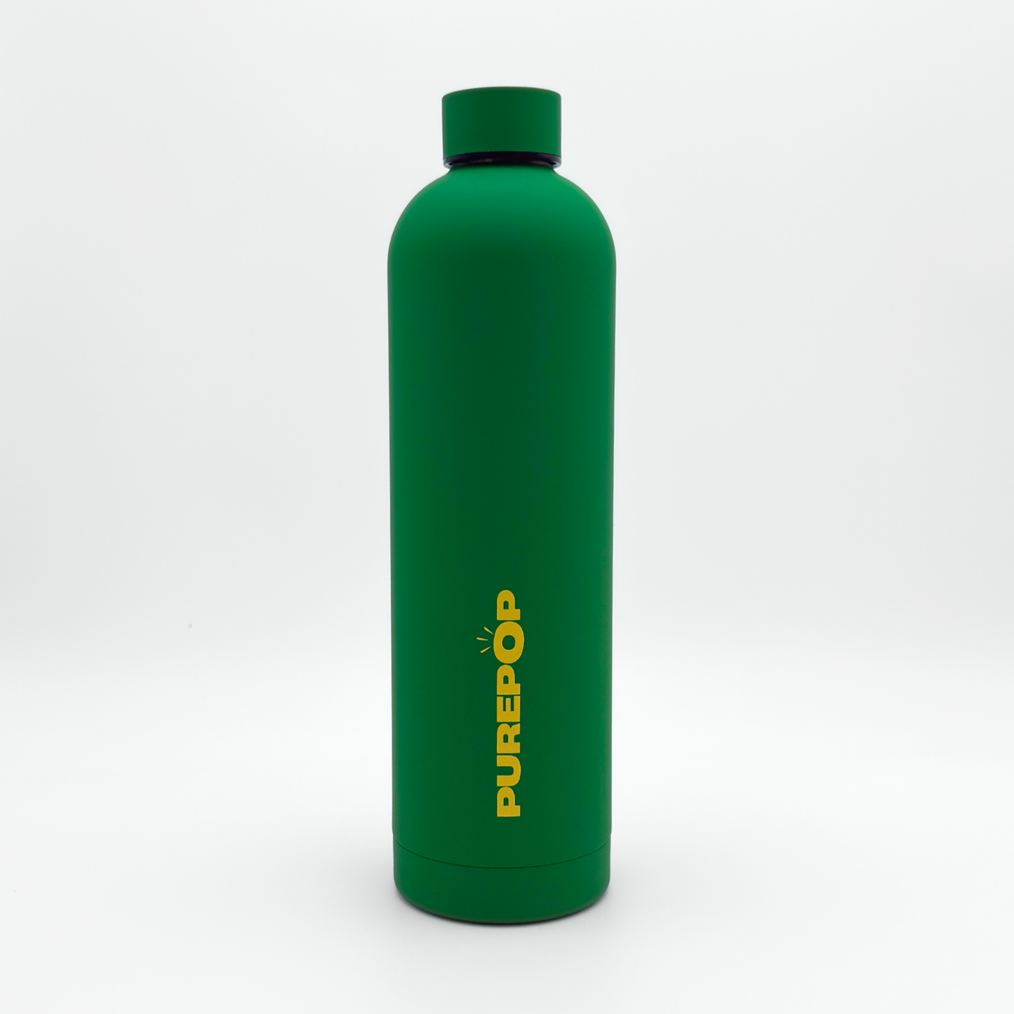 A Core Series Plus | Green & Gold leakproof water bottle stands upright against a plain white background, featuring the word PUREPOP printed vertically in yellow on the front. Crafted from double-walled stainless steel, this insulated flask keeps your drinks at the ideal temperature while offering both style and eco-friendly design.