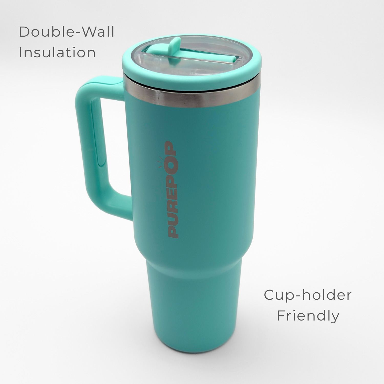 The PurePop™ Carry Series tumbler in Eucalyptus features a handle, lid, double-wall insulation, and a cup-holder friendly design. Its sleek look stands out against a plain white background.
