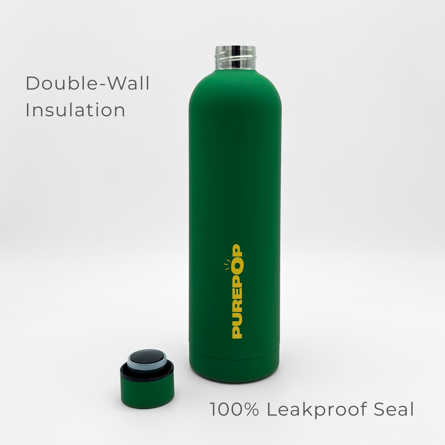 A green and gold insulated water bottle from the Core Series Plus line stands upright with its cap off. Text reads Double-Wall Insulation and 100% Leakproof Seal, highlighting this double-walled stainless steel leakproof water bottle. The background is plain white.