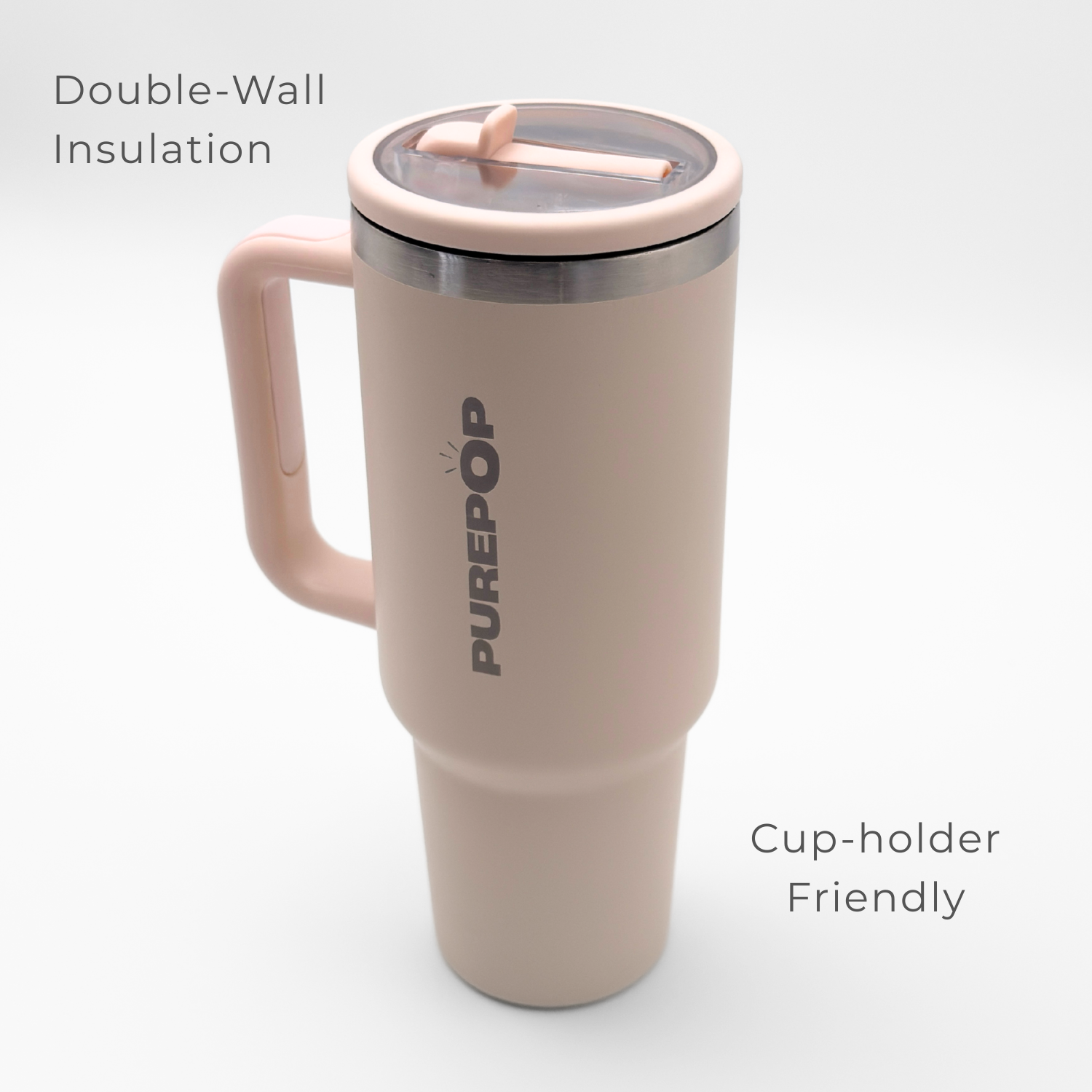 The PurePop™ Carry Series | Rose Quartz is a light pink insulated travel tumbler with a handle and clear lid, featuring double-wall insulation and a cup-holder friendly design—perfect for stylish hydration on the go.