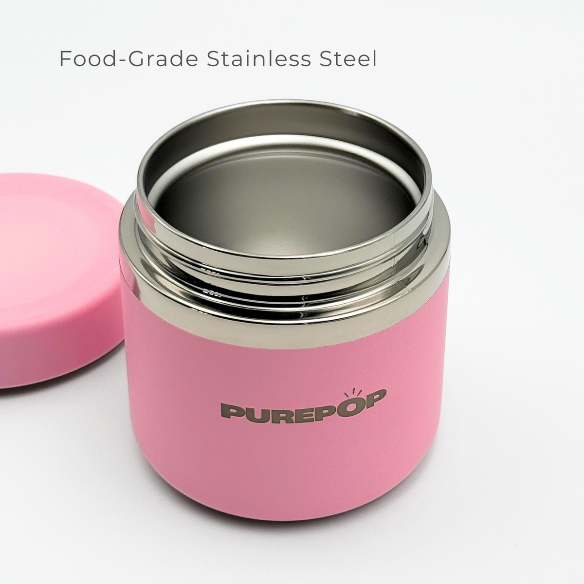 The Purepop Food Flask | Pastel Pink, shown with its lid off, reveals a shiny food-grade stainless steel interior and features the PUREPOP logo, emphasizing its durable design.