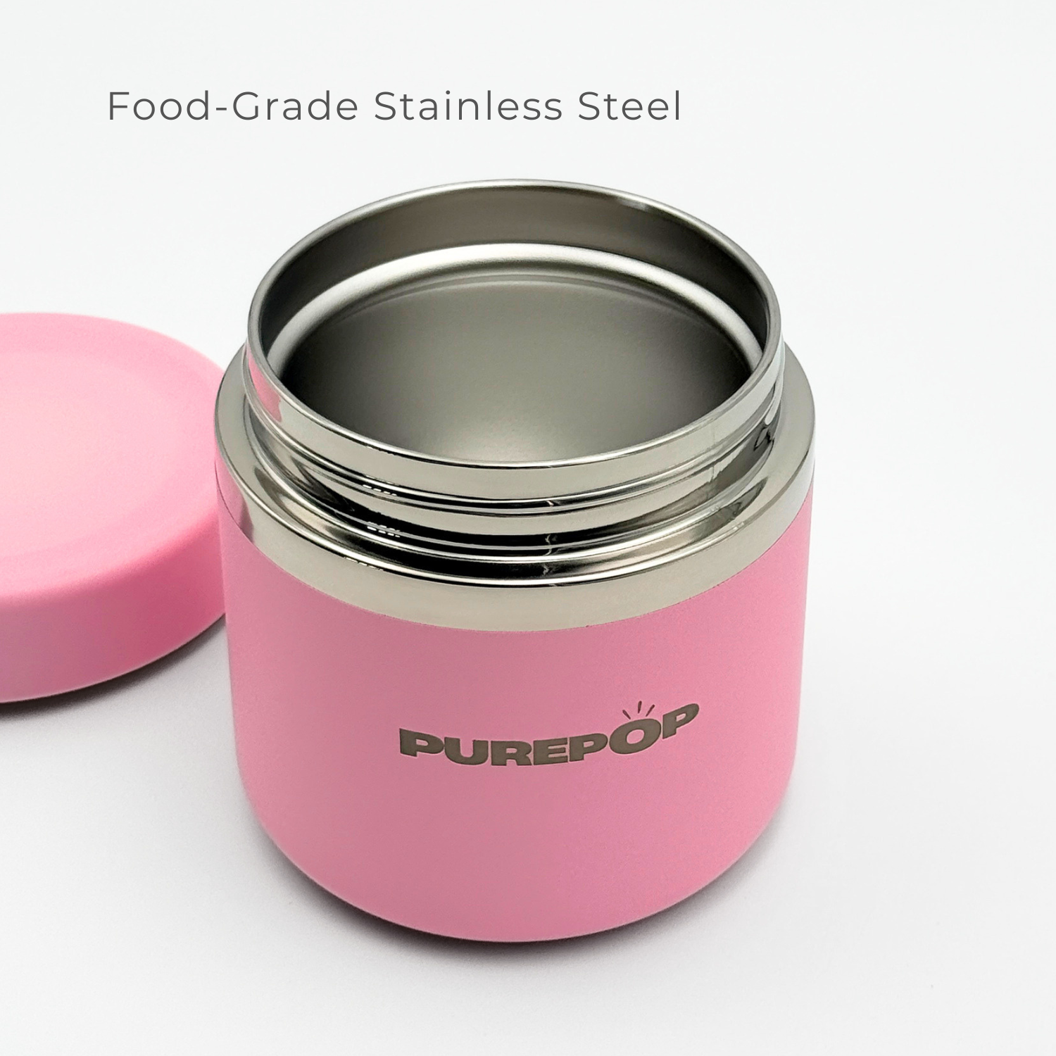 The Purepop Food Flask | Pastel Pink, shown with its lid off, reveals a shiny food-grade stainless steel interior and features the PUREPOP logo, emphasizing its durable design.