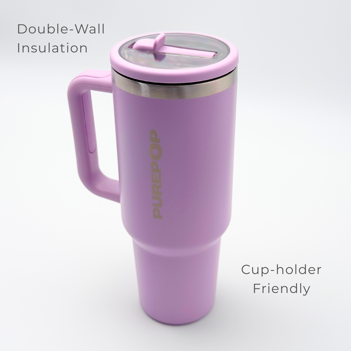 The PurePop™ Carry Series | Soft Lilac travel mug is tall, has a handle and clear lid, features double-wall insulation, and fits in cup holders.