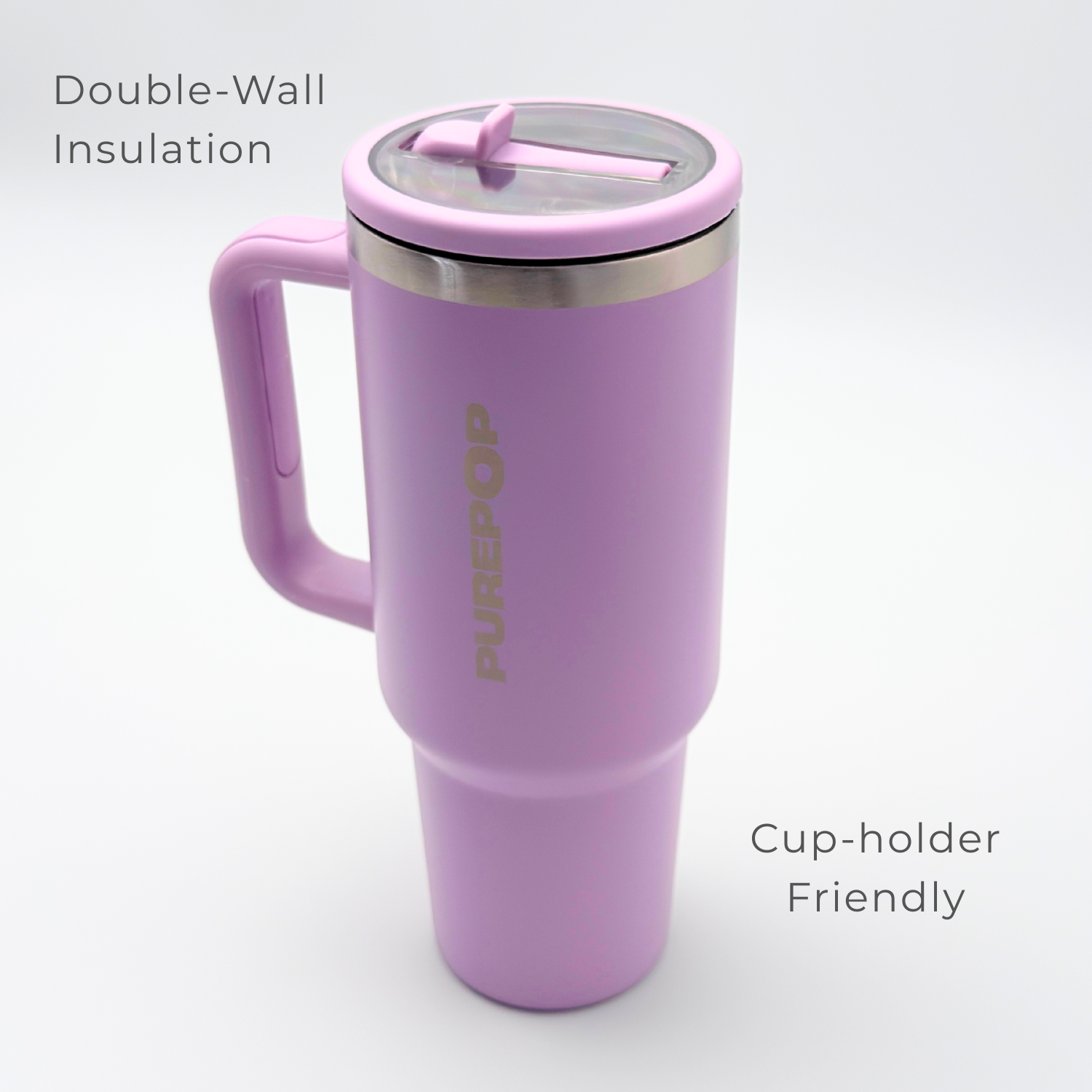 The PurePop™ Carry Series | Soft Lilac travel mug is tall, has a handle and clear lid, features double-wall insulation, and fits in cup holders.