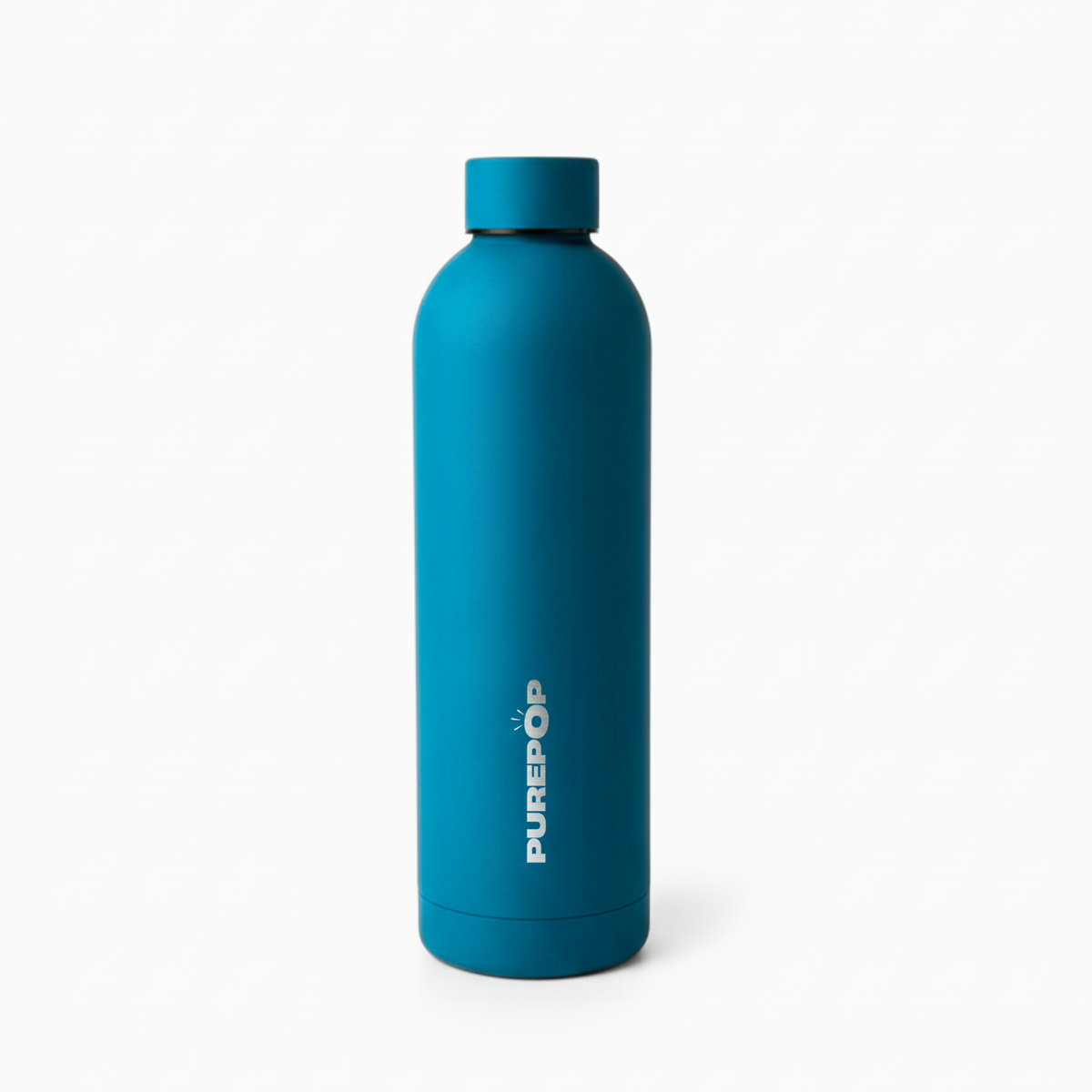 A Core Series | Ocean Blue leakproof bottle by Purepop stands upright on a white background, featuring a screw-on lid and the PUREPOP logo printed vertically in white on its side.
